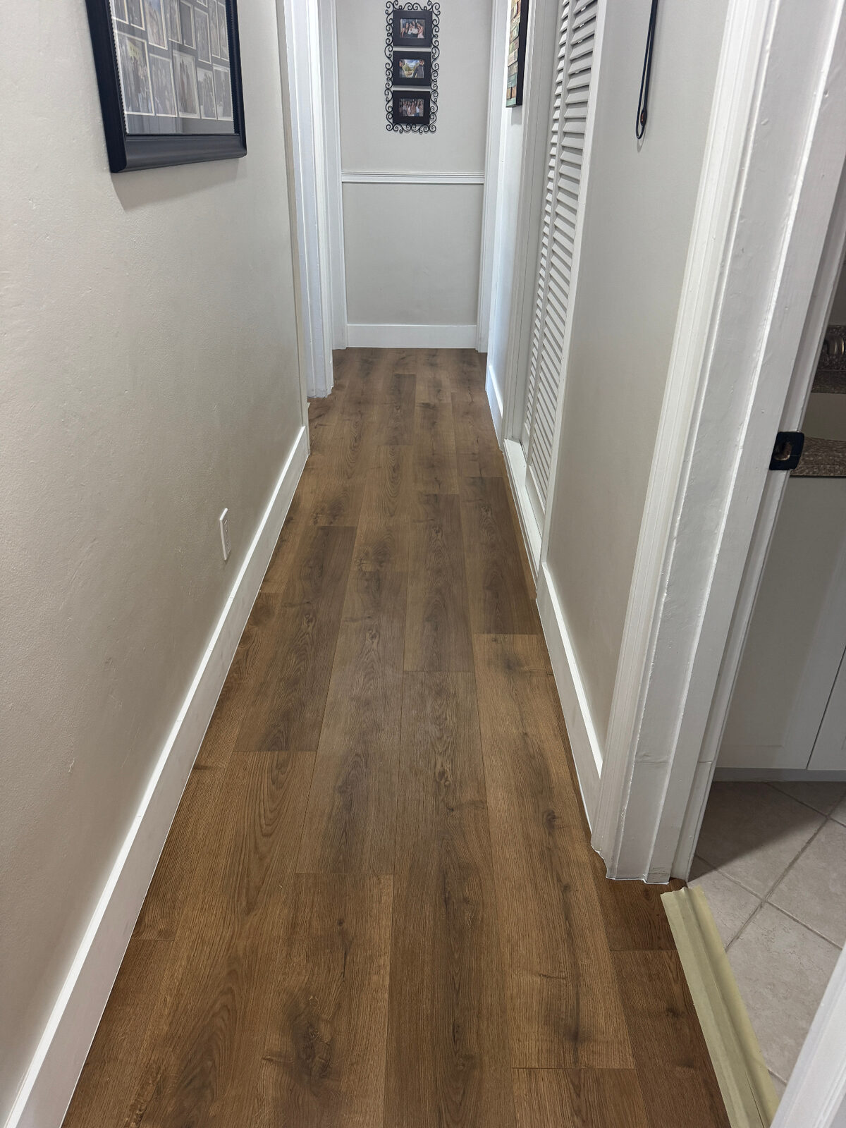White baseboard installation detail
